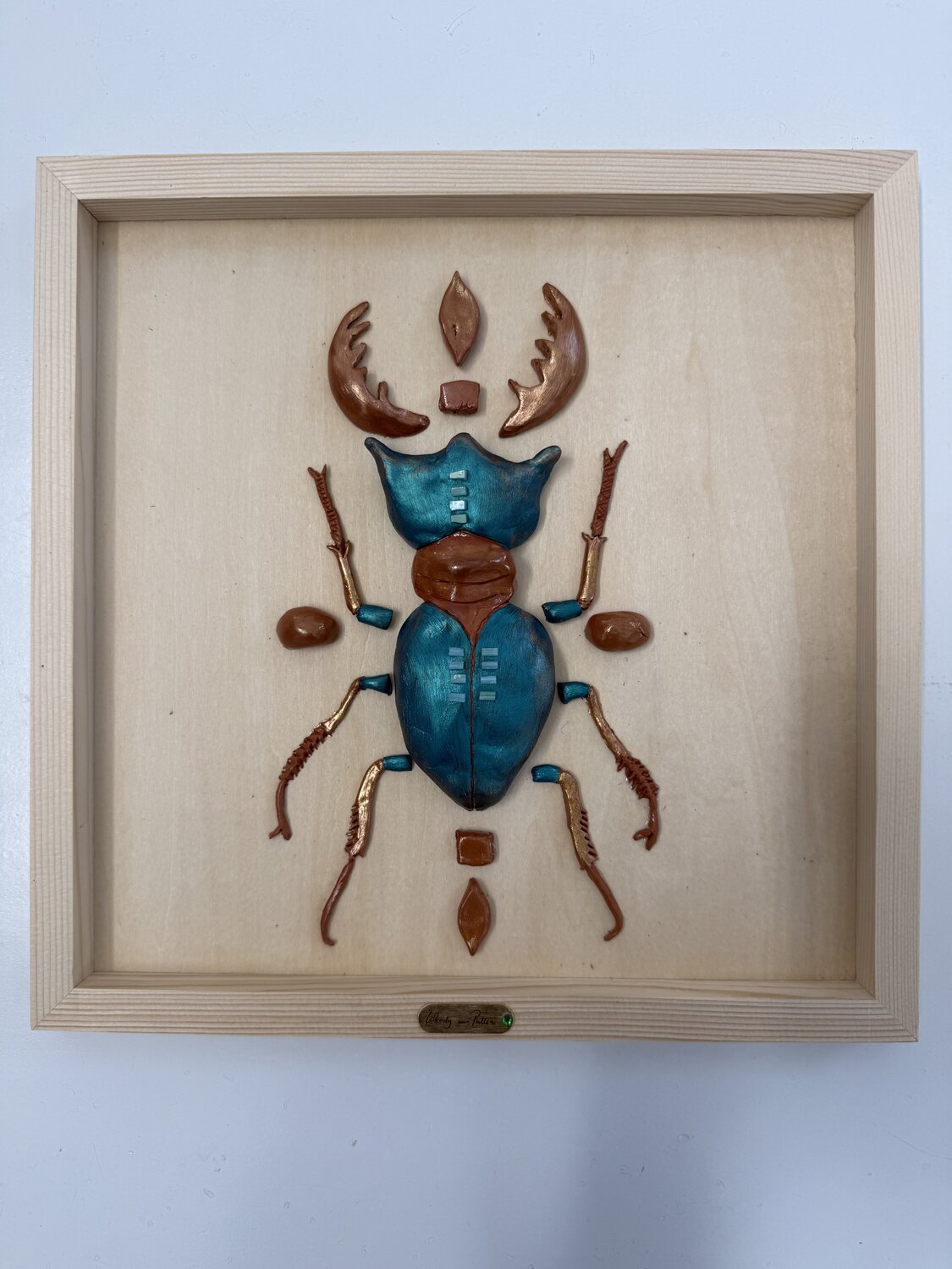 Teal scarabee — detail