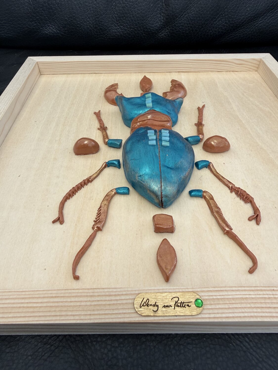 Teal scarabee — detail