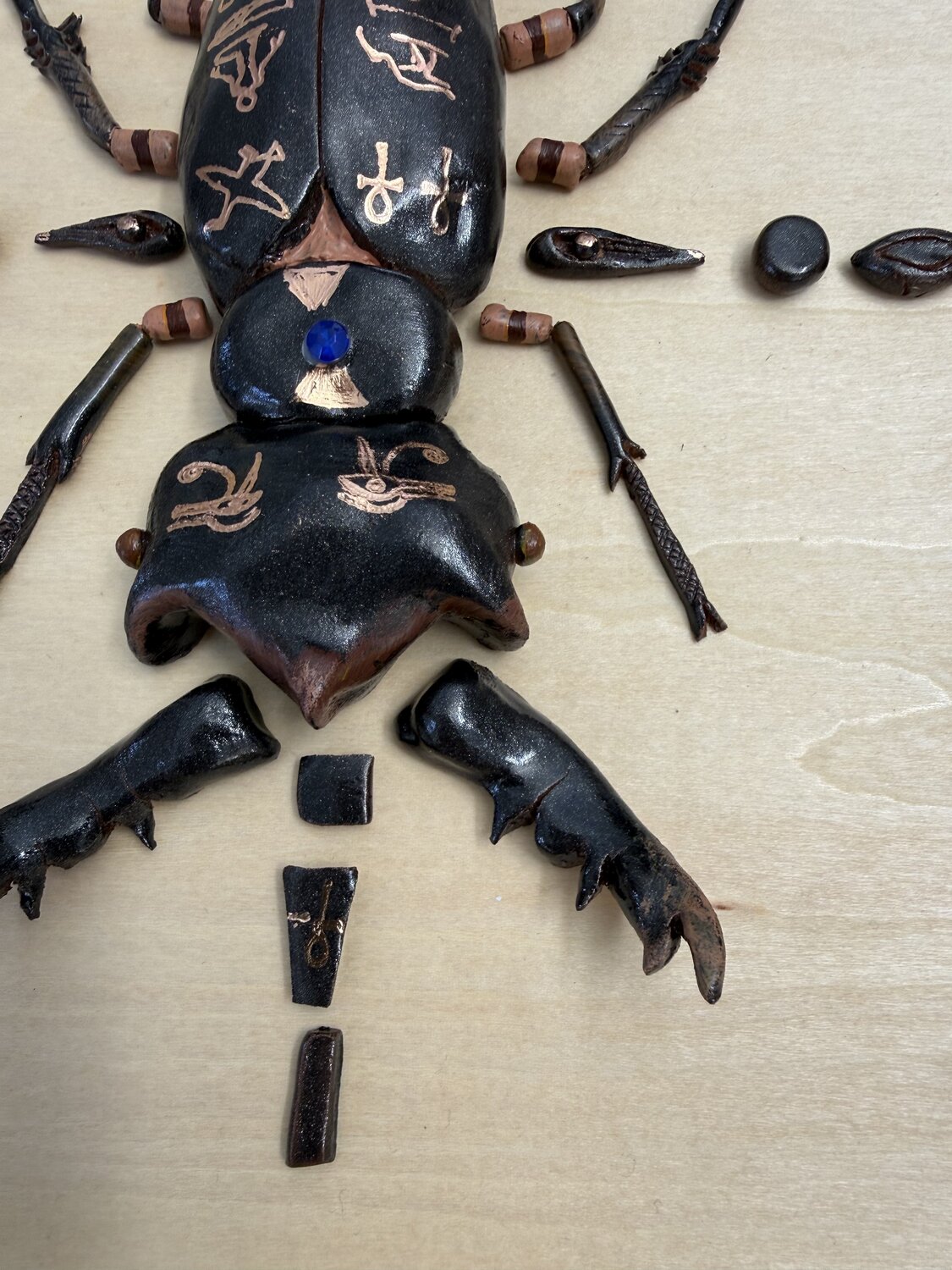 Black scarabee — detail